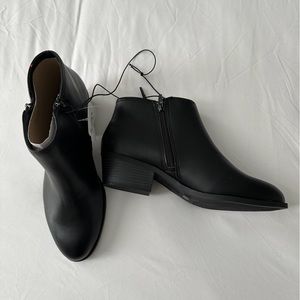 Women’s leather, black booties size 11. Never been worn, New with tags.